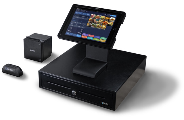 Rezku POS system actively used in a restaurant for order entry and payment processing.